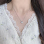 Model wearing the Classic Bezel lab-grown diamond pendant necklace with a round bezel-set diamond