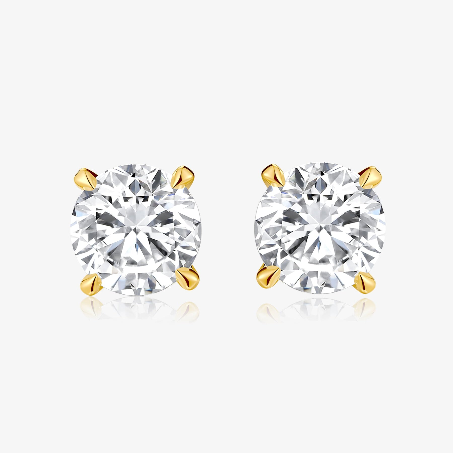 Classic Four-Prong round lab-grown diamond stud earrings with round brilliant diamonds in yellow gold settings