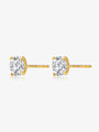 Side view of Classic Four-Prong round lab-grown diamond stud earrings showing the post backs and yellow gold settings