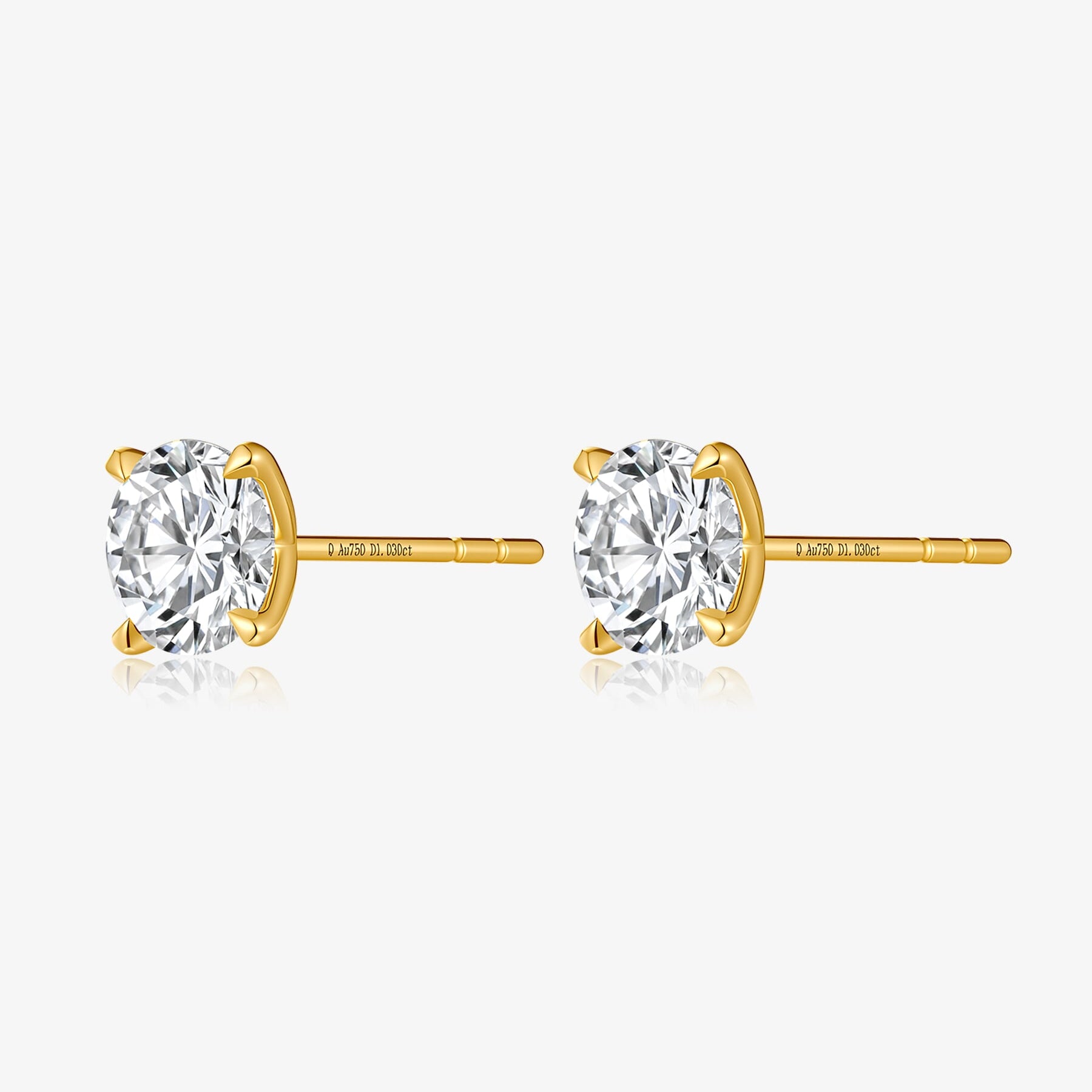 Side view of Classic Four-Prong round lab-grown diamond stud earrings showing the post backs and yellow gold settings