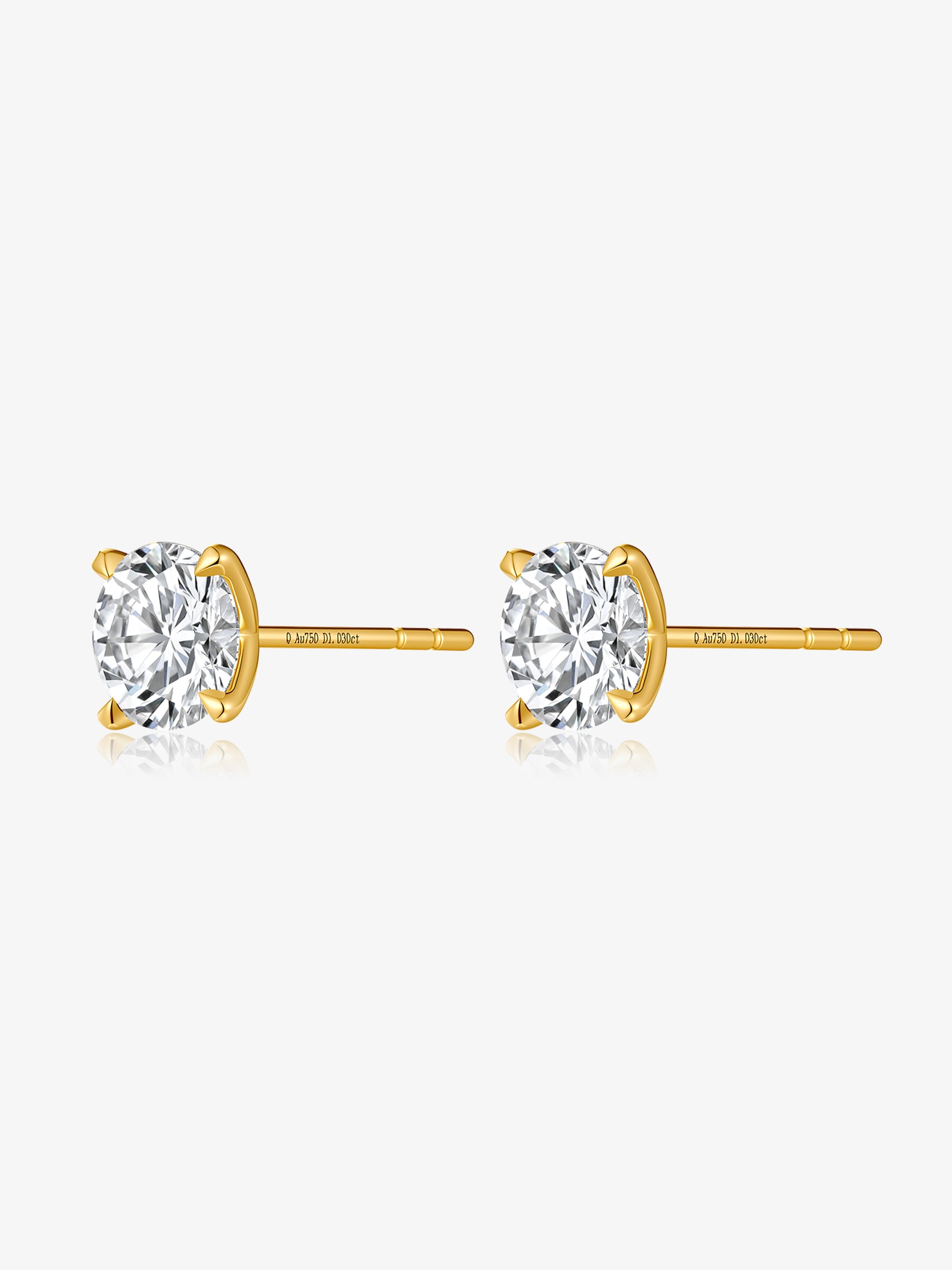 Side view of Classic Four-Prong round lab-grown diamond stud earrings showing the post backs and yellow gold settings
