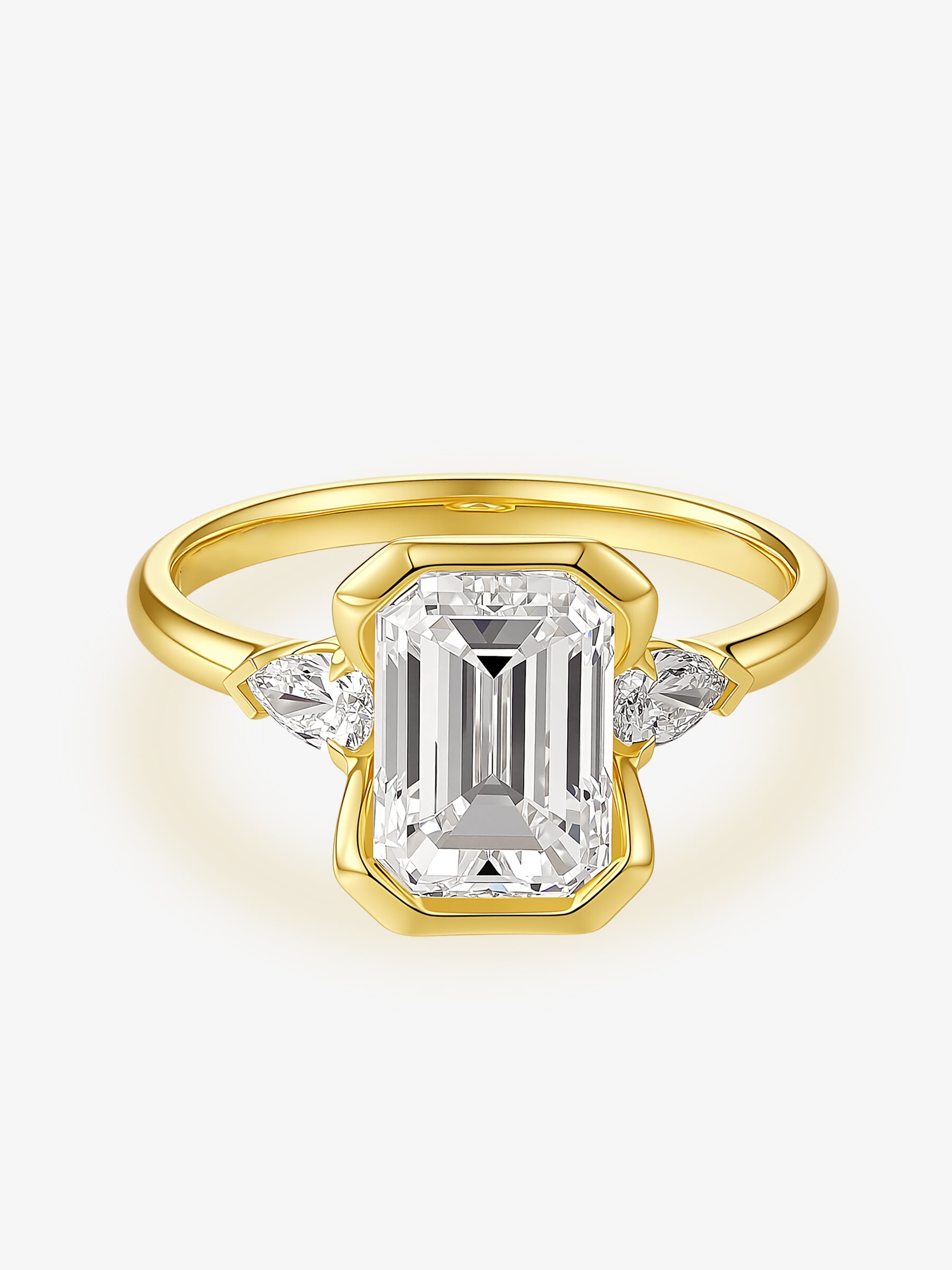 Front view of the Emerald Heirloom Trio lab-grown diamond engagement ring with an emerald-cut center diamond and two side diamonds