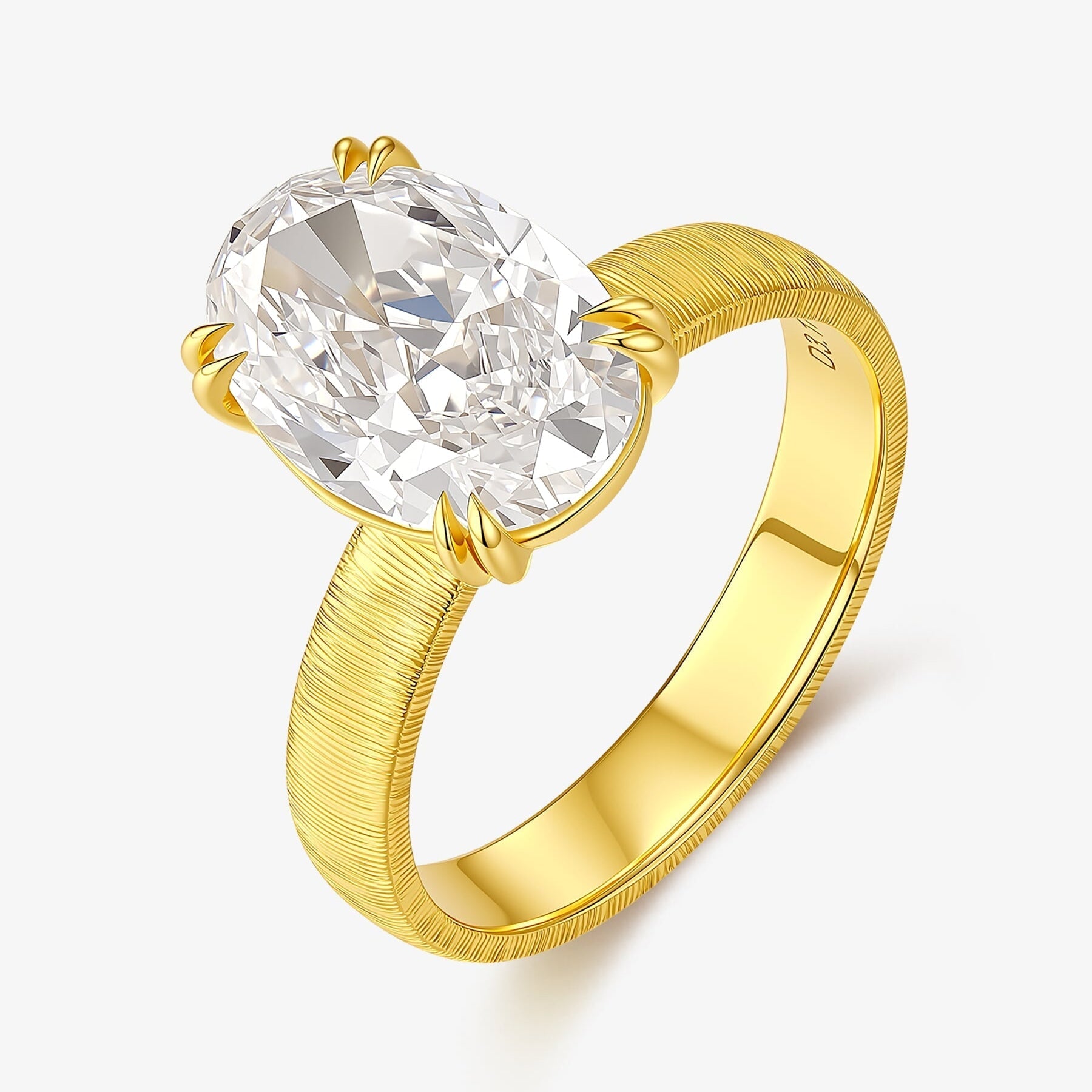 Golden Oval solitaire lab-grown diamond engagement ring with an oval-cut center diamond in a textured yellow gold band