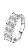 Angled view of the Luminous Five emerald cut lab-grown diamond band ring in a polished white metal setting