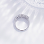 Back view of the Luminous Five emerald cut lab-grown diamond band ring showing the open gallery setting