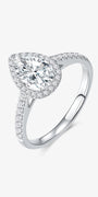 Pear Halo lab-grown diamond engagement ring with a pear-cut center diamond, round diamond halo, and pavé-set band
