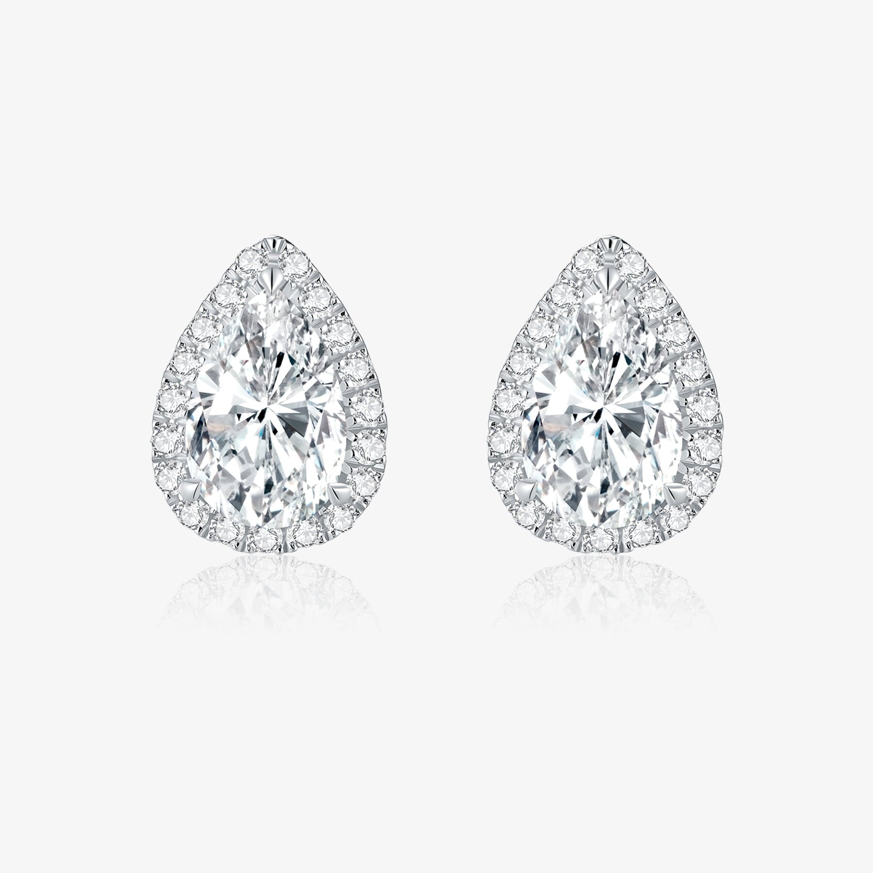 Pear Halo lab-grown diamond stud earrings with pear-cut center diamonds and delicate round diamond halos