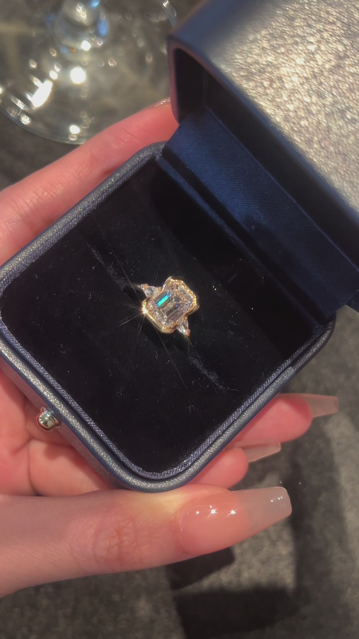 Video of the Emerald Heirloom Trio lab-grown diamond engagement ring featuring an emerald-cut center diamond and delicate side diamonds