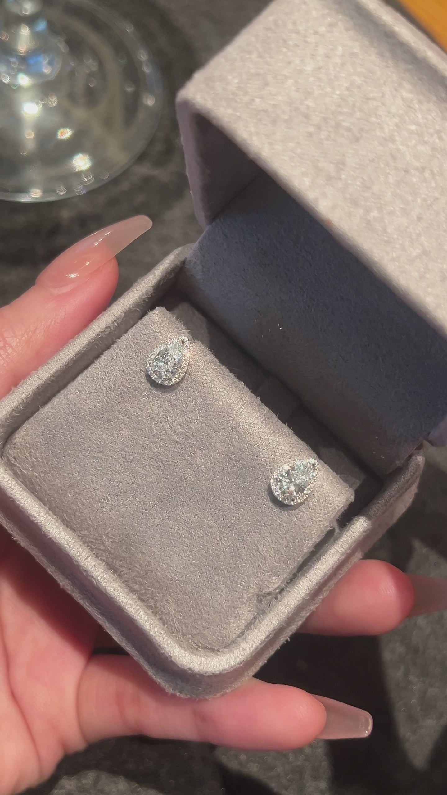 Video of the Pear Halo lab-grown diamond stud earrings featuring pear-cut center diamonds framed by delicate round diamond halos