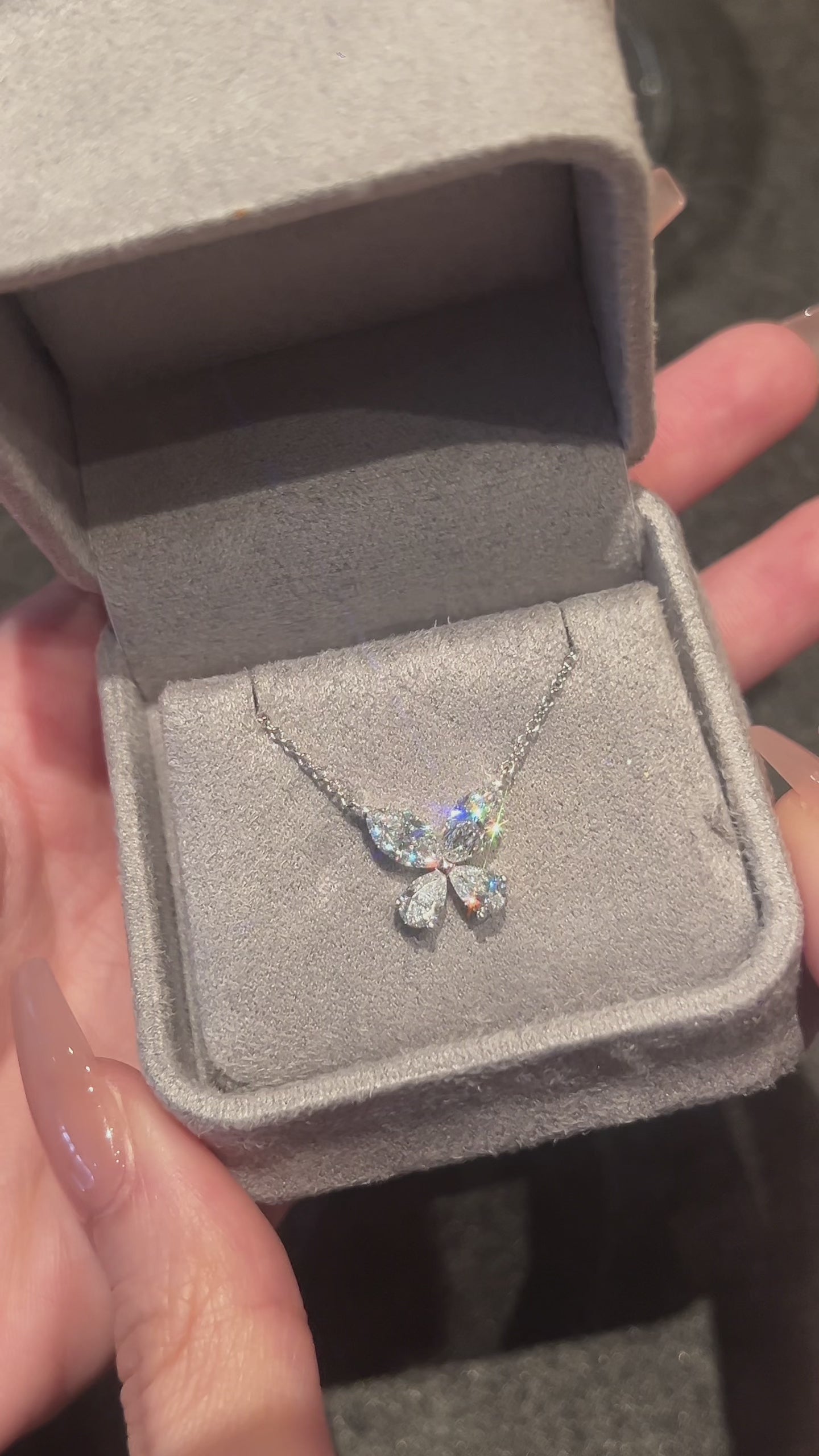 Video of the Butterfly marquise lab-grown diamond pendant necklace featuring four marquise-cut diamonds in a delicate butterfly silhouette