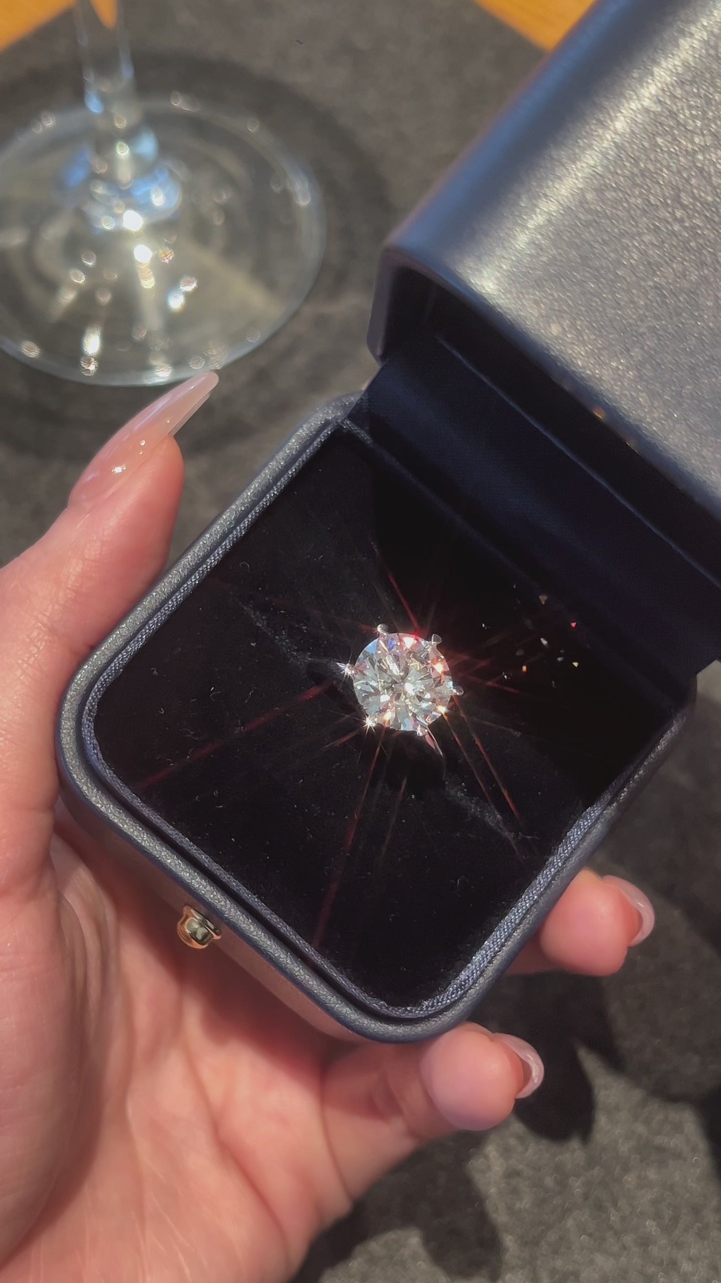 Video of the Classic Six-Prong round lab-grown diamond engagement ring in its jewelry box, featuring an round center diamond in a refined six-prong setting
