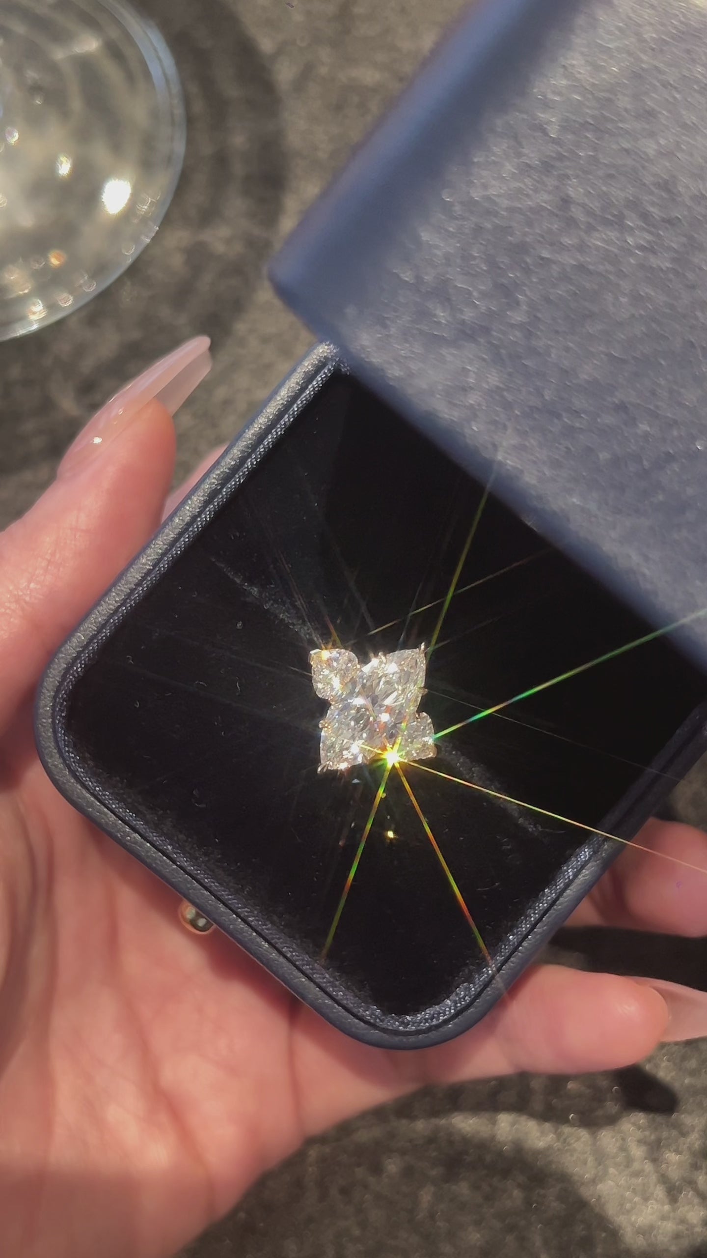 Video of the Marquise Grace Trio lab-grown diamond engagement ring featuring a marquise-cut center diamond and heart-shaped side stones