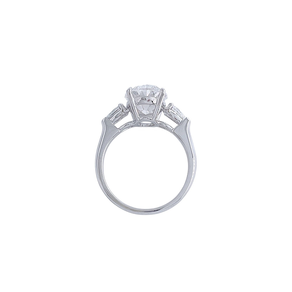 Profile view of the Soft Oval Trio lab-grown diamond engagement ring showing the setting structure and side stones
