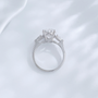 Side view of the Soft Oval Trio lab-grown diamond engagement ring showing the oval center diamond and side stones